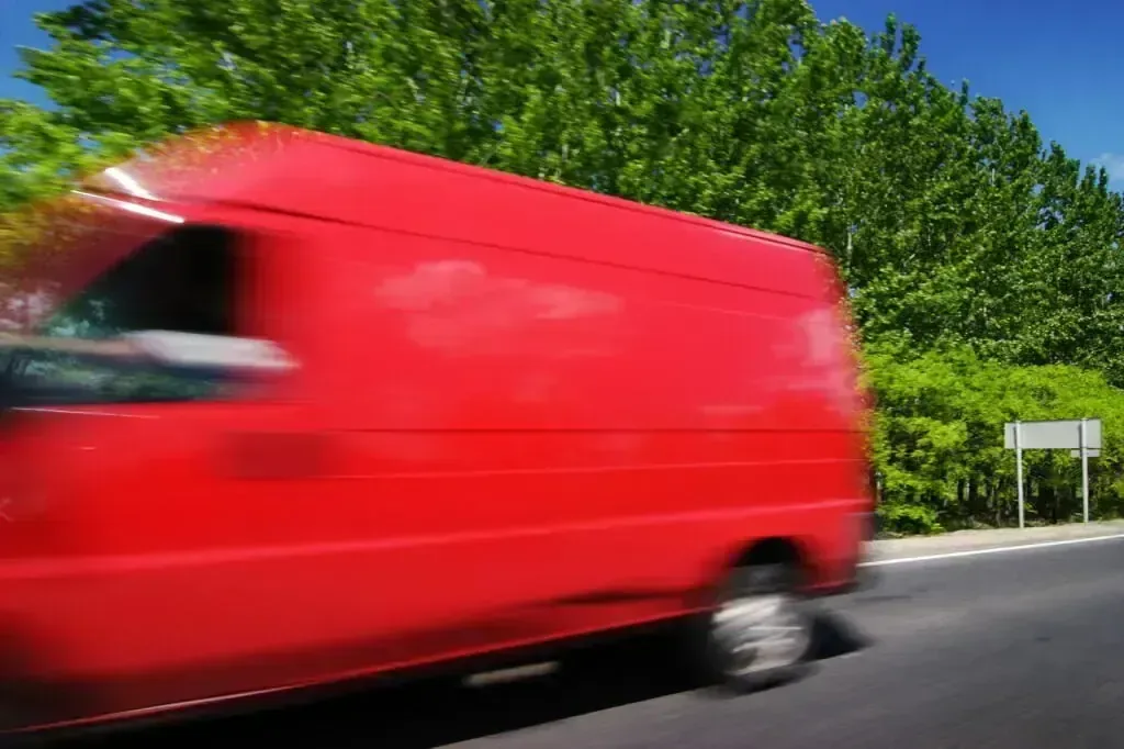 Redline Courier delivery van providing same-day courier service in California